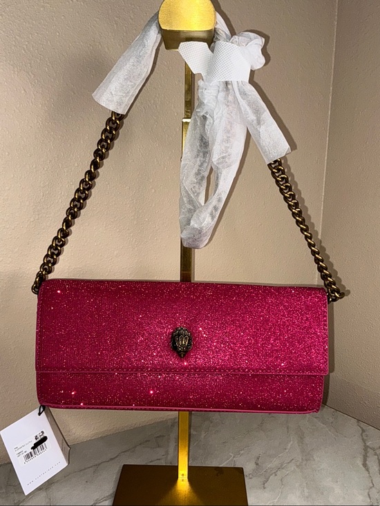 Kurt Geiger Handbags - Kurt Geiger London elongated clutch vibrant pink glitter finish w/ eagle head.